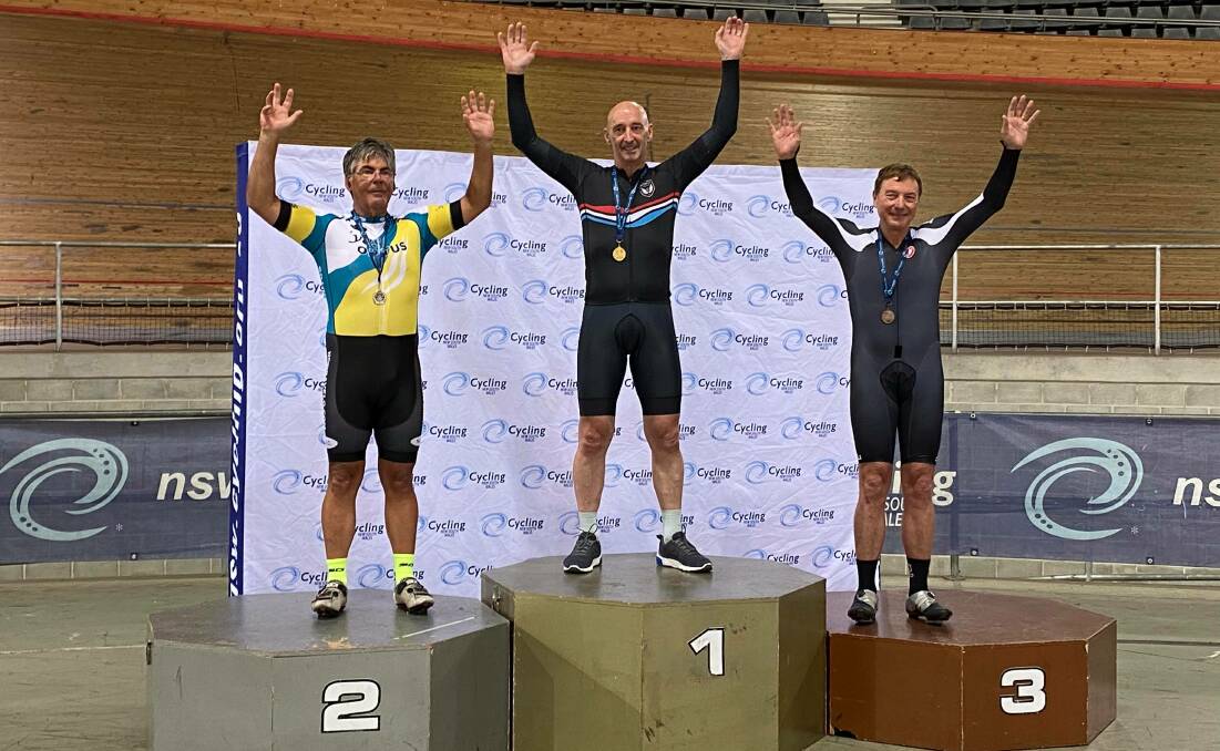 Adrian McMillan with silver in his NSW masters individual pursuit championship.