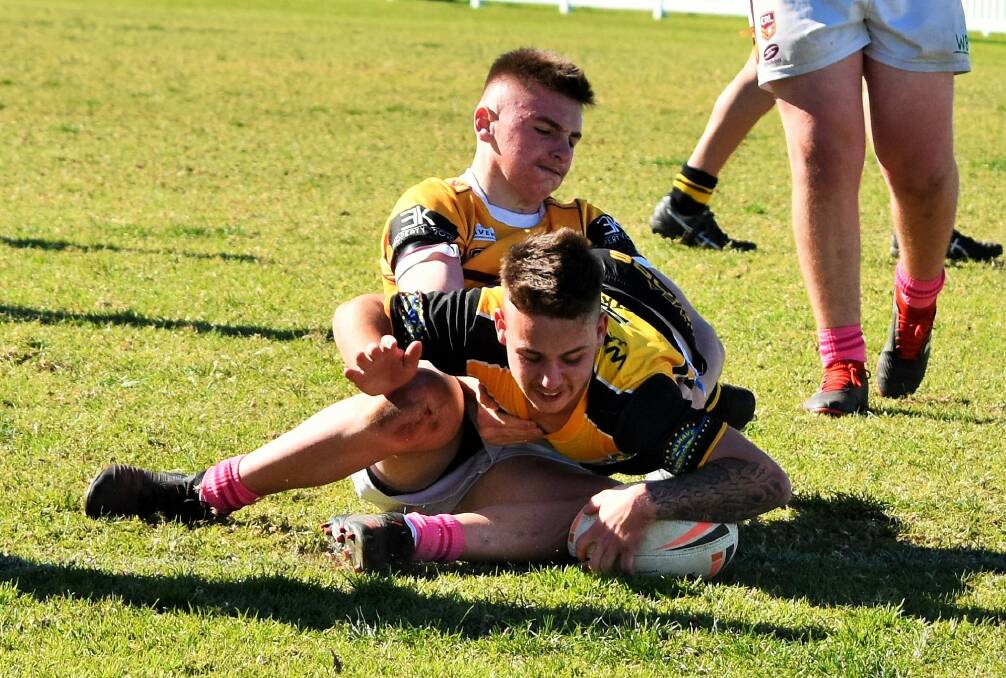 Surprise: Hooker Cameron Haydock caught the defence napping to score this try against the Sharks. Photo: JAKKI HAYDOCK