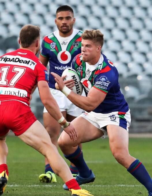 Jack Murchie takes a hit-up against the Dragons on Saturday. Photo: WARRIORS MEDIA