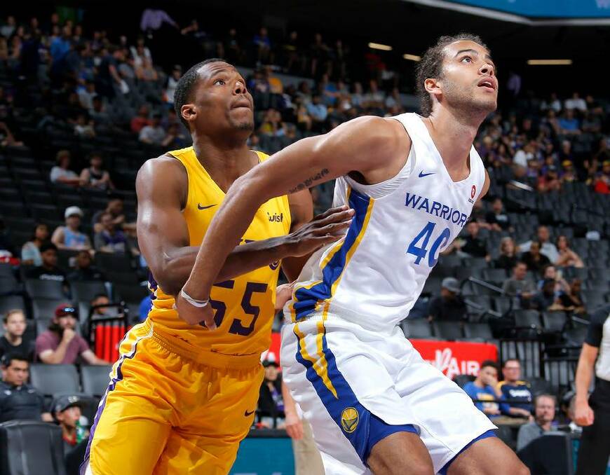 Xavier Cooks boxes out an opponent while playing for Golden State during the NBA Summer League. Photo: SUPPLED