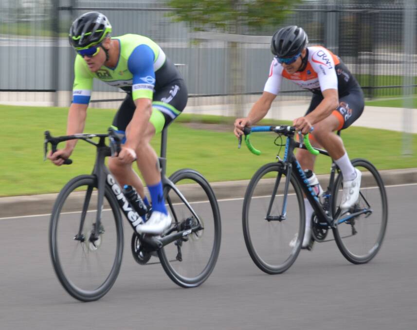 On the attack: Jordan Ross leads Simon Clark to the finish of the A grade race in Nowra Velo Club's first criterium of the year on Sunday.