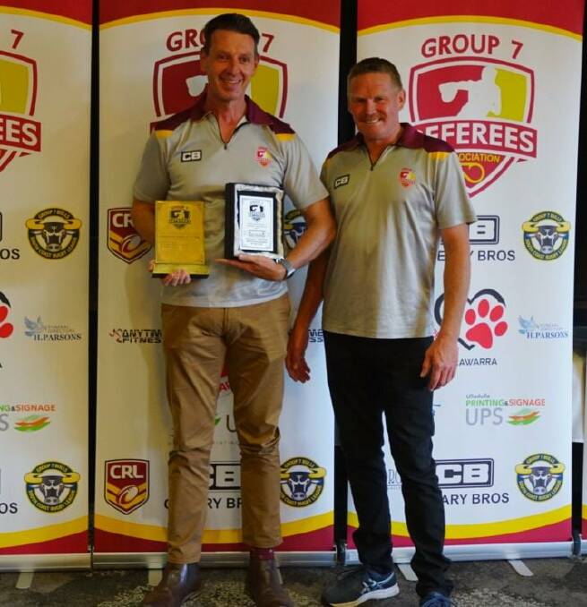 Mark Goroch (right) presents Greg Pfieffer with his Group Seven Referees' Association Association Member of the Year award. Photo: Supplied