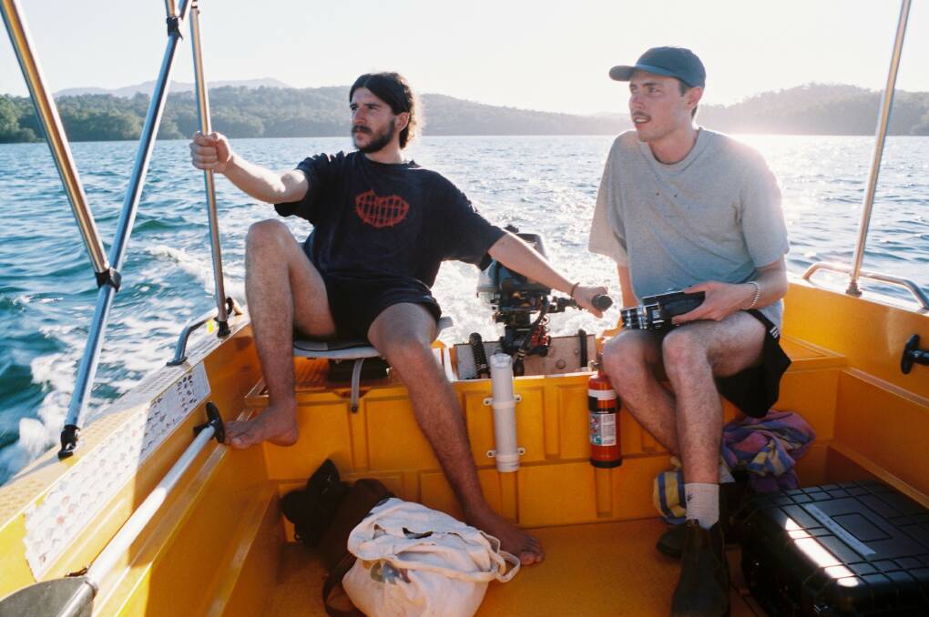 Monty O'Brien (right) shoots a scene of his short film off the coast of Narooma where he grew up. 