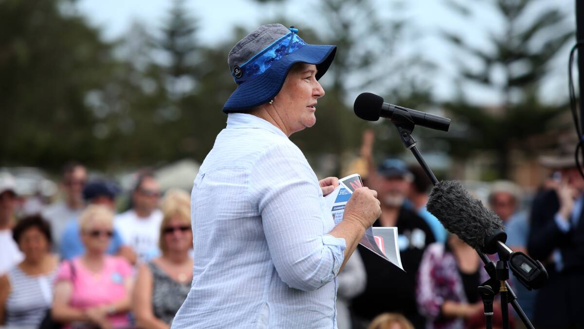 CHALLENGED: Gilmore MP Ann Sudmalis addresses an anti-merger rally in Shellharbour in 2016. Photo: Sylvia Liber