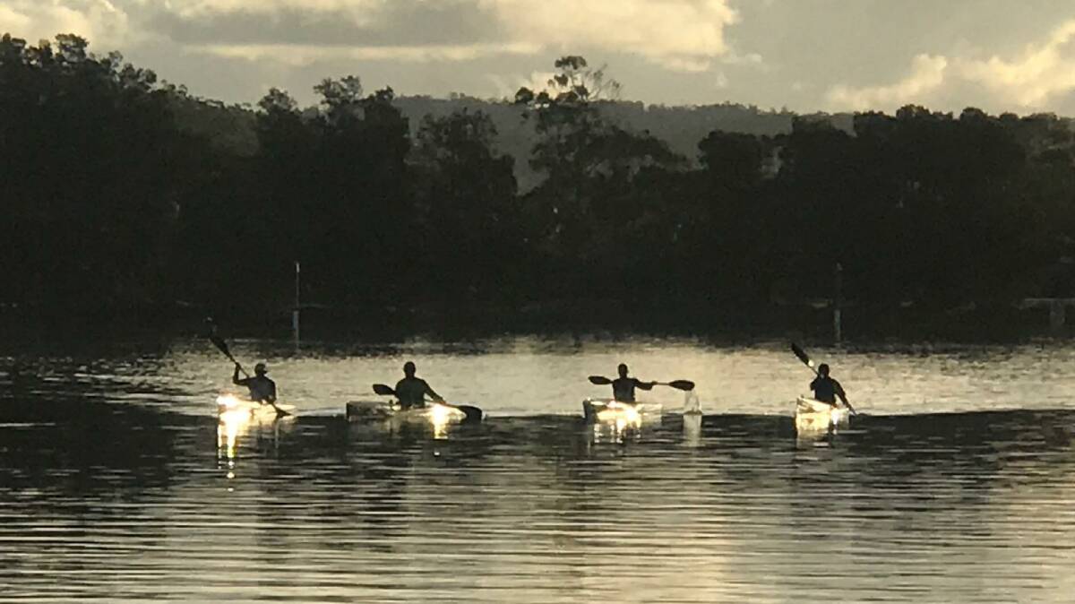 PIC OF THE DAY: Rowers on Burrill Lake by Mike Pool. Email your photos to editor@southcoastregister.com.au