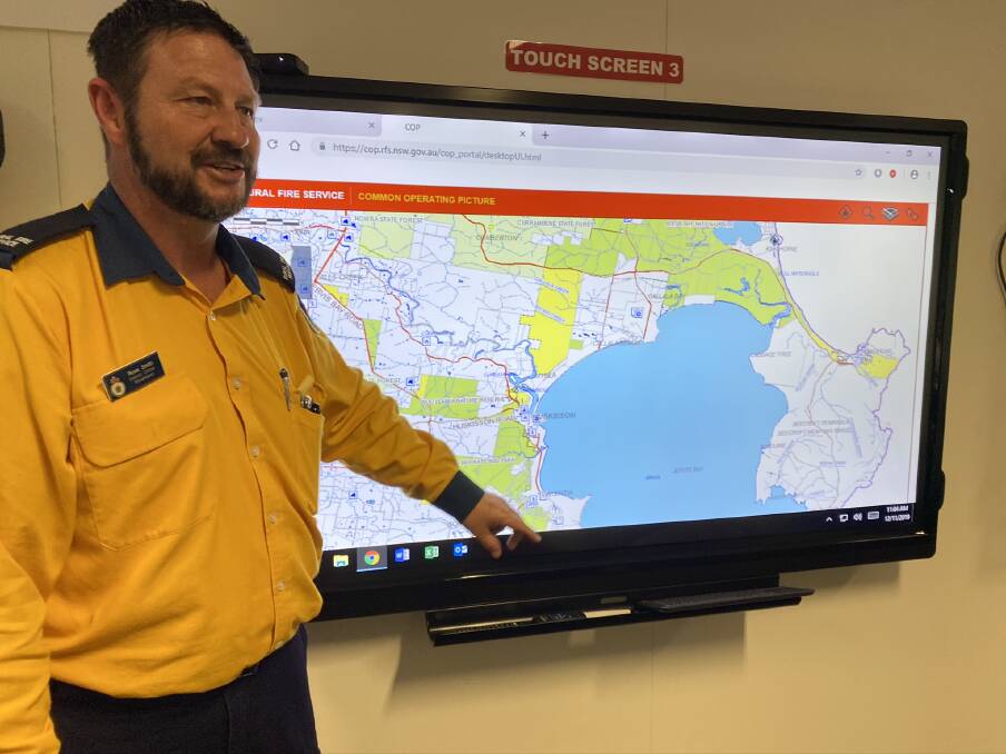 MAKE YOUR PLAN: RFS district officer Ross Smith says while conditions have eased, fire risk would increase over the next week.