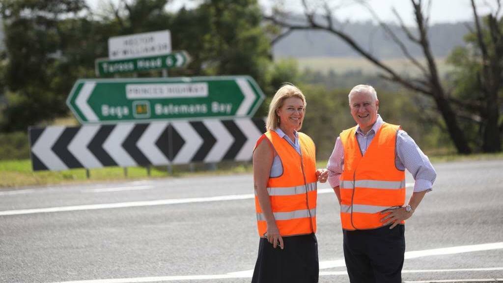 BIG SPENDERS: Katrina Hodgkinson and National leader Michael McCormack on the Princes Highway. 