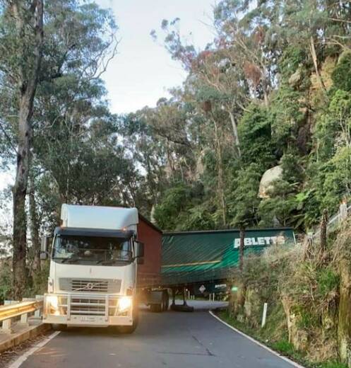 A truck has gotten stuck on Macquarie Pass on Monday morning, causing the road to close. Picture: Facebook
