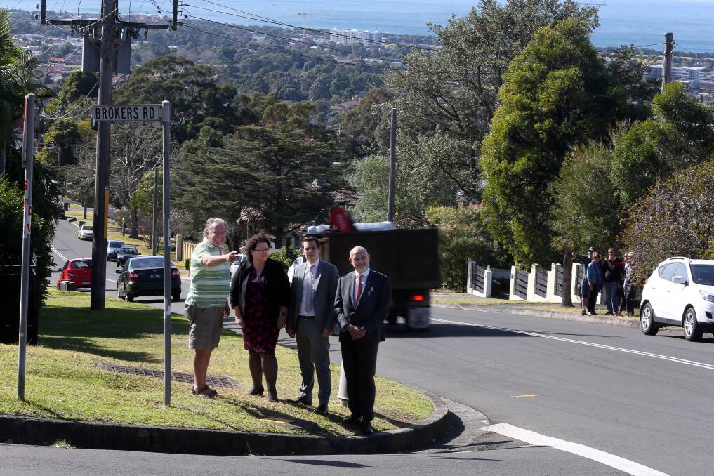 RAT RUN: New Mt Pleasant Road resident Tony Pearce (left) explains the problems with speeding drivers along the road to Keira MP Ryan Park and Wollongong City councillor David Brown. Picture: Robert Peet