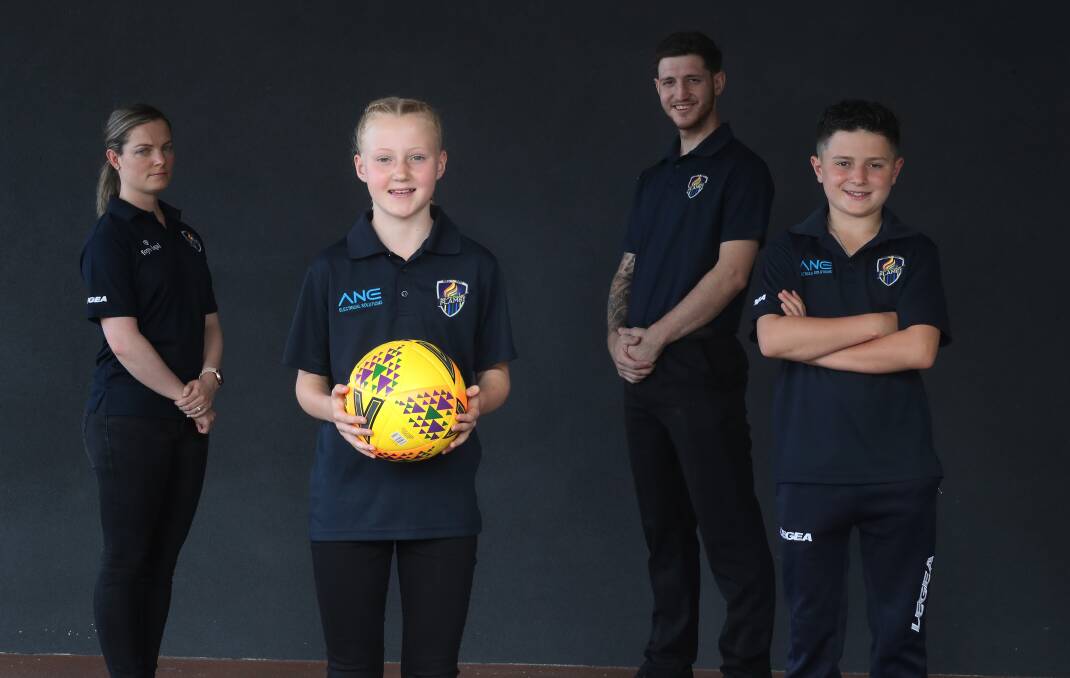 Emi Skopal, Isabella Elsner, Matt Mazevski and Andre Dzeparoski are excited South Coast Flame becoming the first local club to have all teams competing in Football NSW state competitions. Photo: Robert Peet