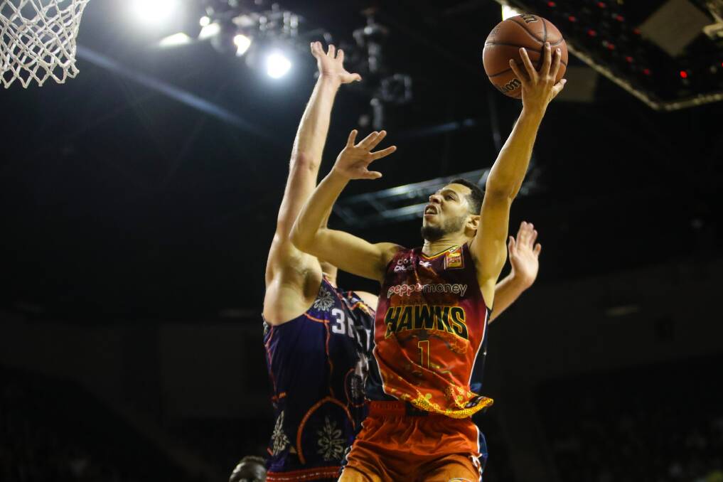 Tyler Harvey flies towards the basket during Illawarra's win over the 36ers on Sunday afternoon. Photo: Adam McLean