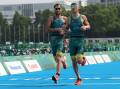PROUD: Wollongong-based Para-triathlete Jonathan Goerlach and his guide David Mainwaring competing at last year's Paralympic Games in Tokyo. Picture: Lintao Zhang/Getty Images