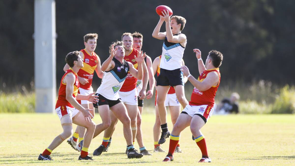 All of the action from Kiama's AFL South Coast win over Shellharbour at Myimbarr Oval on Saturday. Photos: Anna Warr