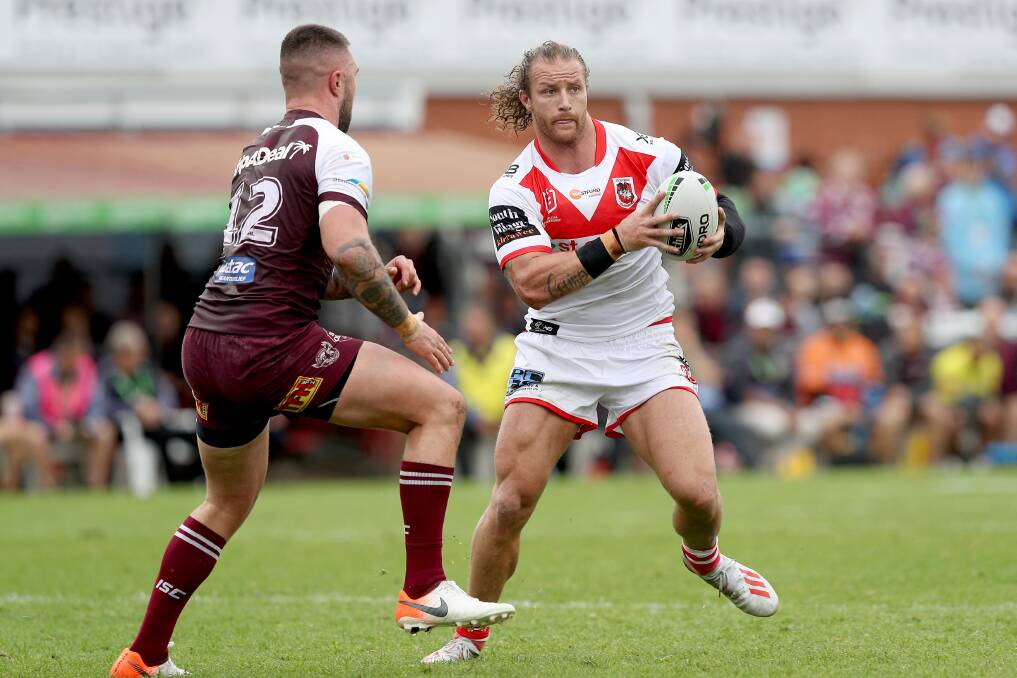 St George Illawarra Dragons forward Korbin Sims takes on a Manly-Warringah opponent. Photo: NRL Imagery