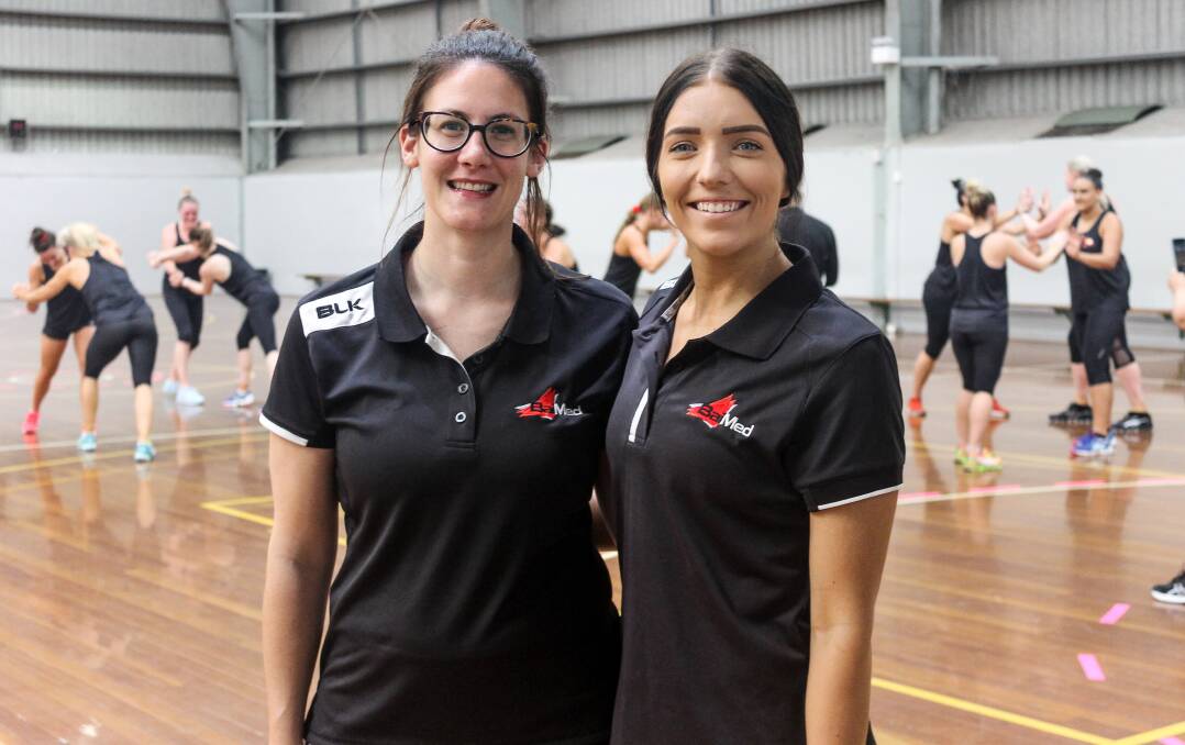 South Coast Blaze's head physiotherapist Kat Dawson with strength and conditioning coach Maddie Stephens, both from BaiMed Performance. Photo: South Coast Blaze