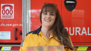 SURVIVAL: Amanda Saxton with the RFS Get Ready survial booklet