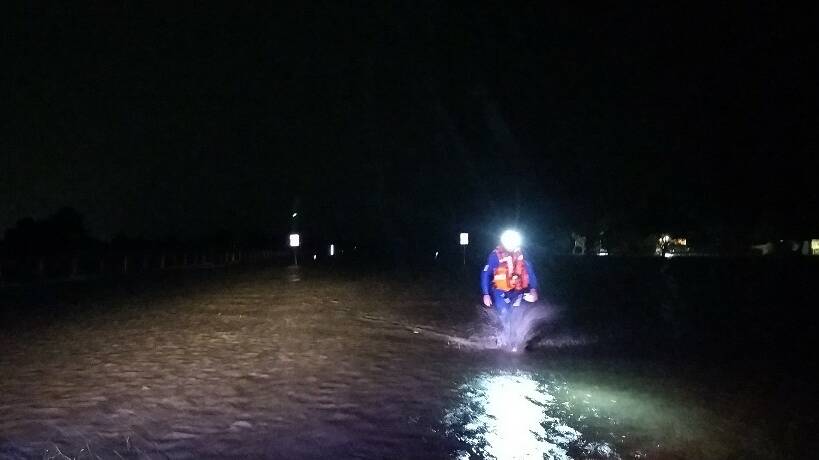 Crews often have to trudge through cold floodwater to rescue people. Picture: NSW SES Kiama Unit