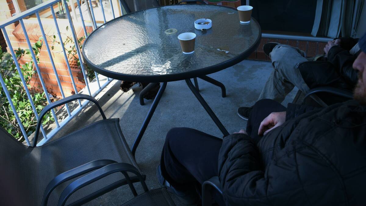 DONATE: Two men at the Shoalhaven Homeless Hub, faces have been obscured. Photo: Hannah Neale. 