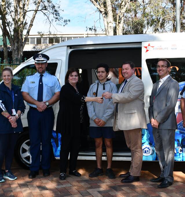 ON BOARD: Commander Mark Wall with South Coast MP Shelley Hancock, YUIN Snakes captain, Kaleb Stewart and VIPs celebrated the arrival of the new bus to improve community outreach. Photo: Hannah Neale. 