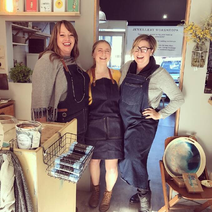 SMILES ALL ROUND: Meagan Graham from Maple Ridge Goat Soap, junior staff member Morgan Dootson and The Artisan Collective owner Naomi Dootson.