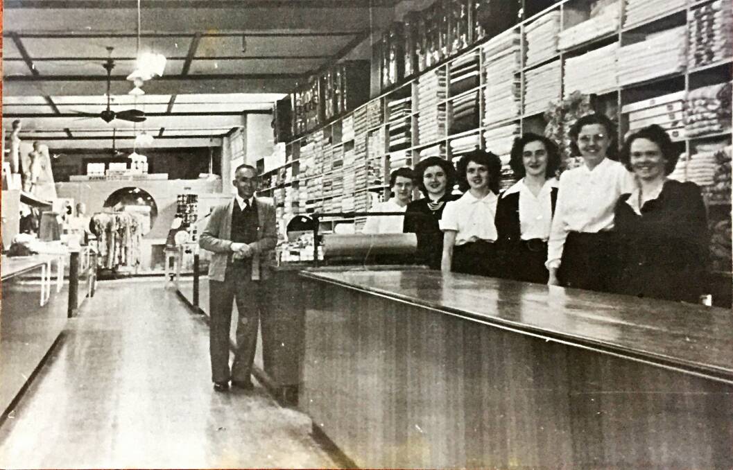 EYES OPEN: The late Joe Basha with his staff in the 1950; he took a failing business and turned it into the successful operation that continues today.