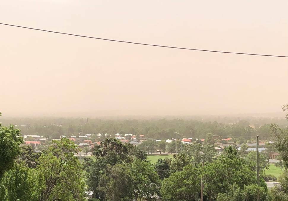  Wagga's sky has turned red as dust rolls through the city. Picture: Ross Tyson.