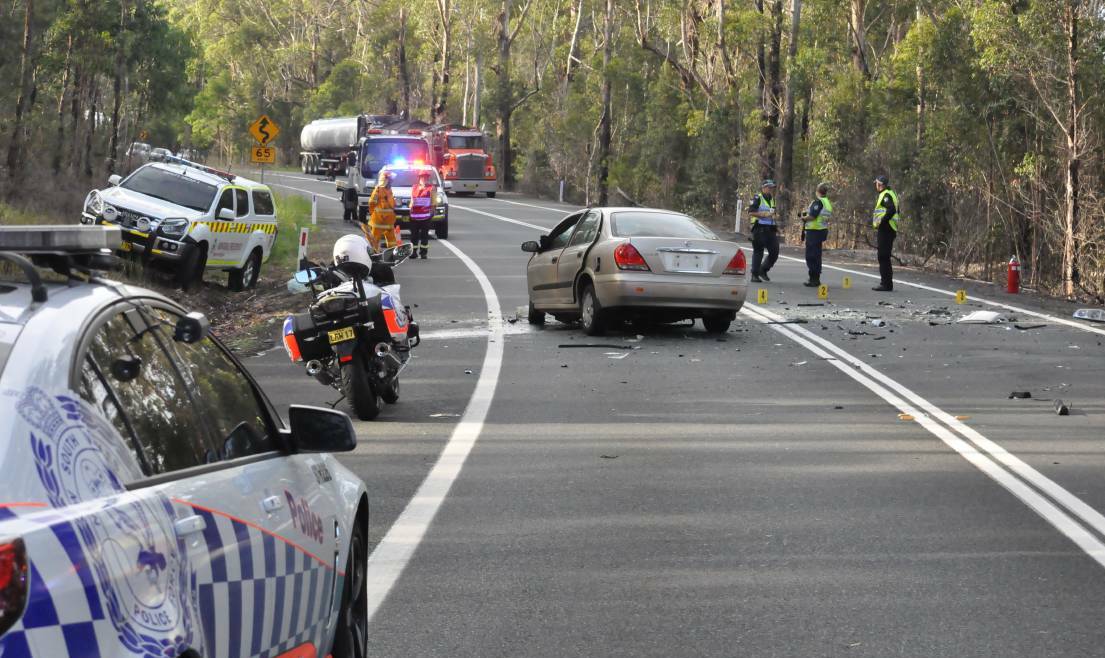 ROAD SAFETY: The scene of a car crash on the Princes Highway at Jerrawangala last February where two people were killed. 