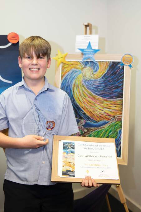Leo Wallace-Pannell with his award-winning artwork 'Overjoyed'. 
