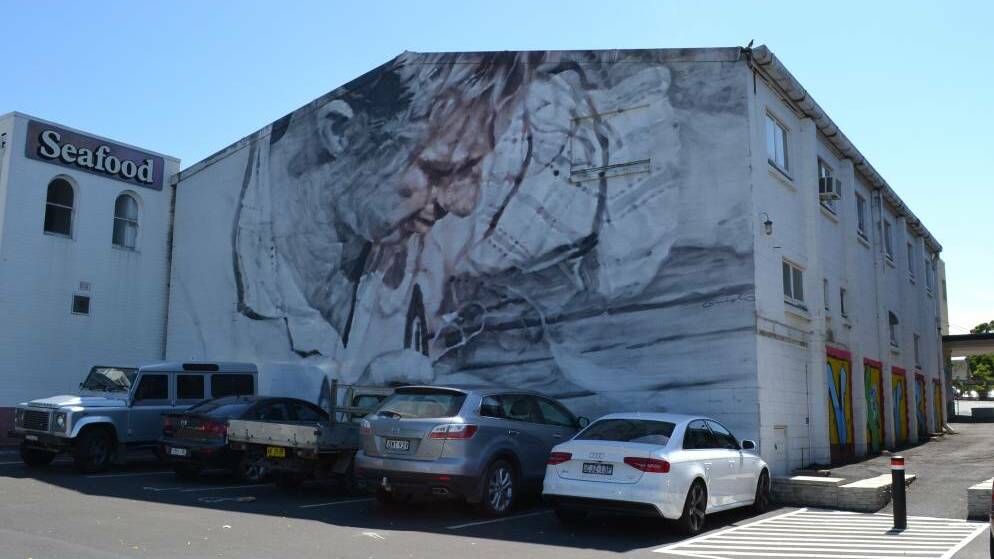 One of Verb Syndicate's older pieces in Nowra. International artist Guido Van Helten brought the entrance to Nowra’s live gallery walk to life with his interpretation of a picture taken by the late Jeff Carter of a fisherman mending a net in Greenwell Point.