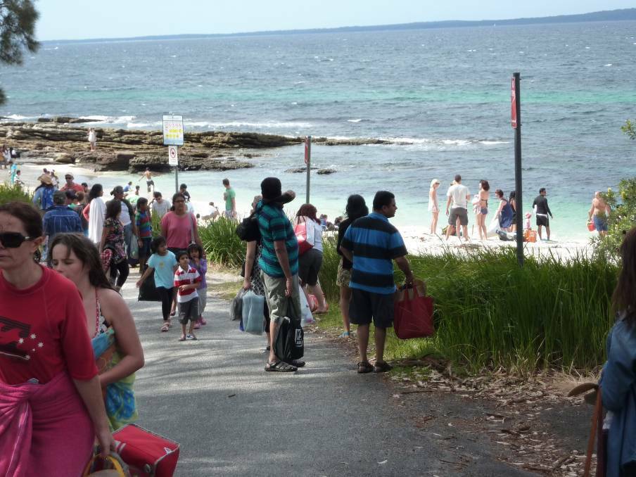 Visitors flock to Hyams Beach during peak season last year. 