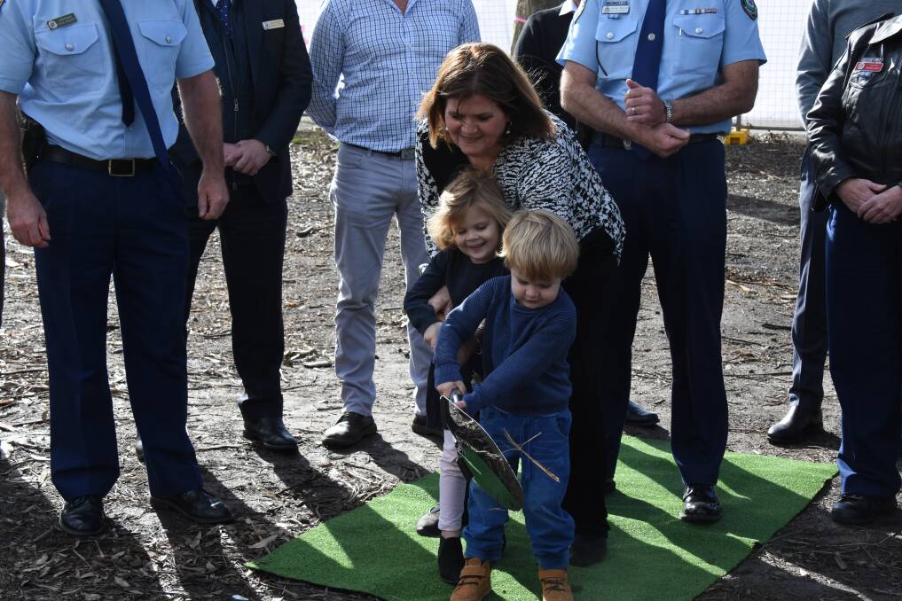 TURNING OF THE SOD: South Coast MP Shelley Hancock turns the first sod at the new Bay and Basin Police Station with two of her grandchildren. Photo: Madeline Crittenden. 