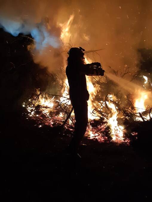 Kangaroo Valley RFS firefighters extinguishing an escaped pile burn this week. Photo: Kanagaroo Valley Rural Fire Brigade Facebook. 