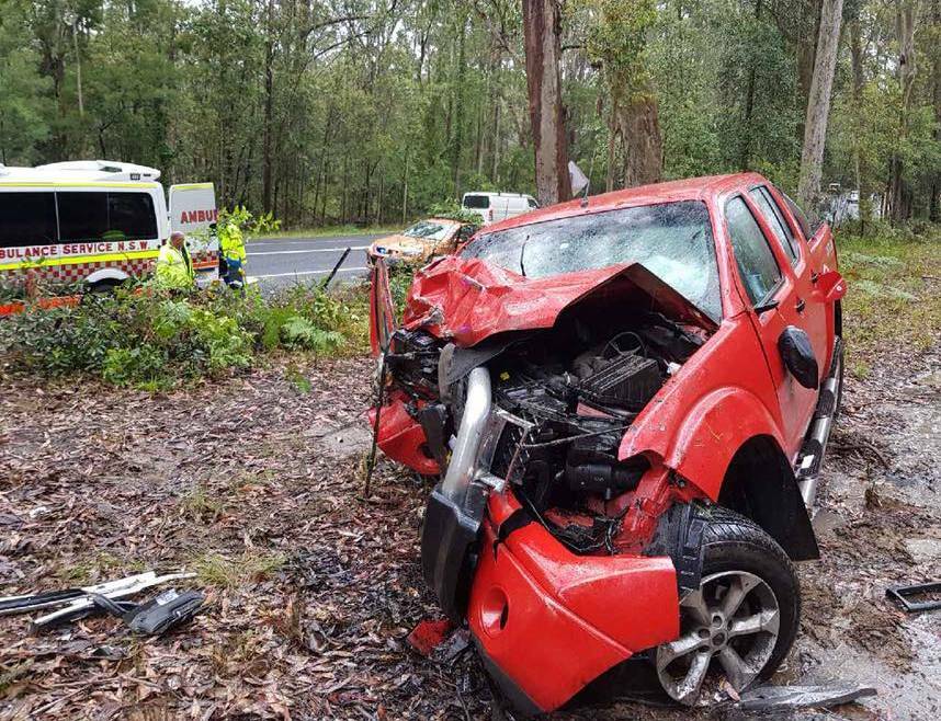 LUCKY ESCAPE: A man escaped with minor injuries after his ute left the Princes Highway near Basin View and collided with a tree. Photo: St Georges Basin RFS.