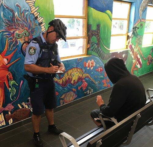 Police arresting a 32-year-old male at Albion Park after he and his partner allegedly stole meat and assaulted a 60-year-old-man. Photo: NSW Police Force. 