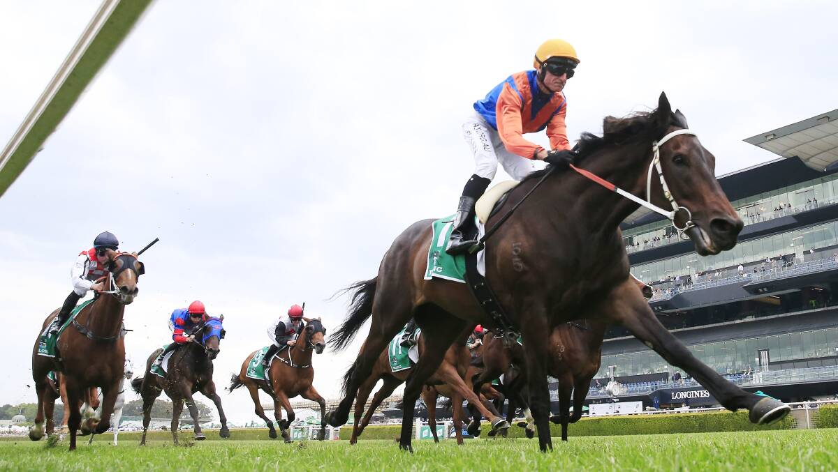 Glen Boss rides Think It Over to victory in the Group 3 Craven Plate on Saturday afternoon. Picture: Mark Evans