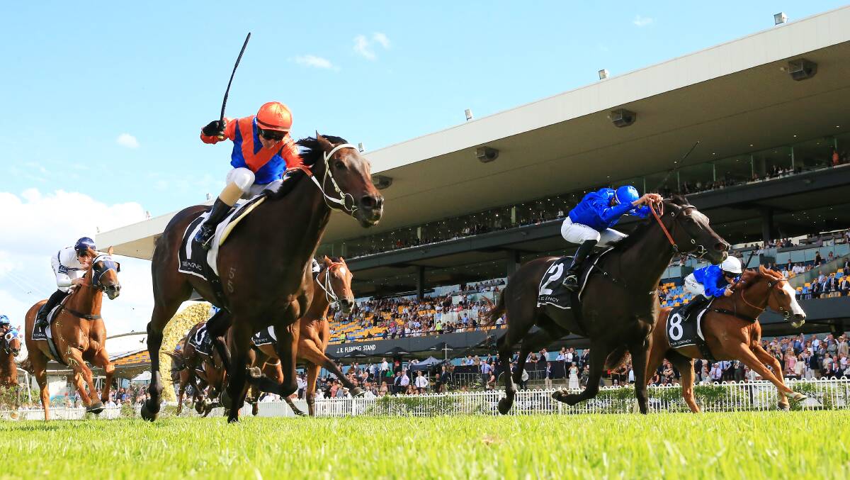 Glen Boss gets Think It Over (left) home in Saturday's George Ryder Stakes. Photo: Mark Evans