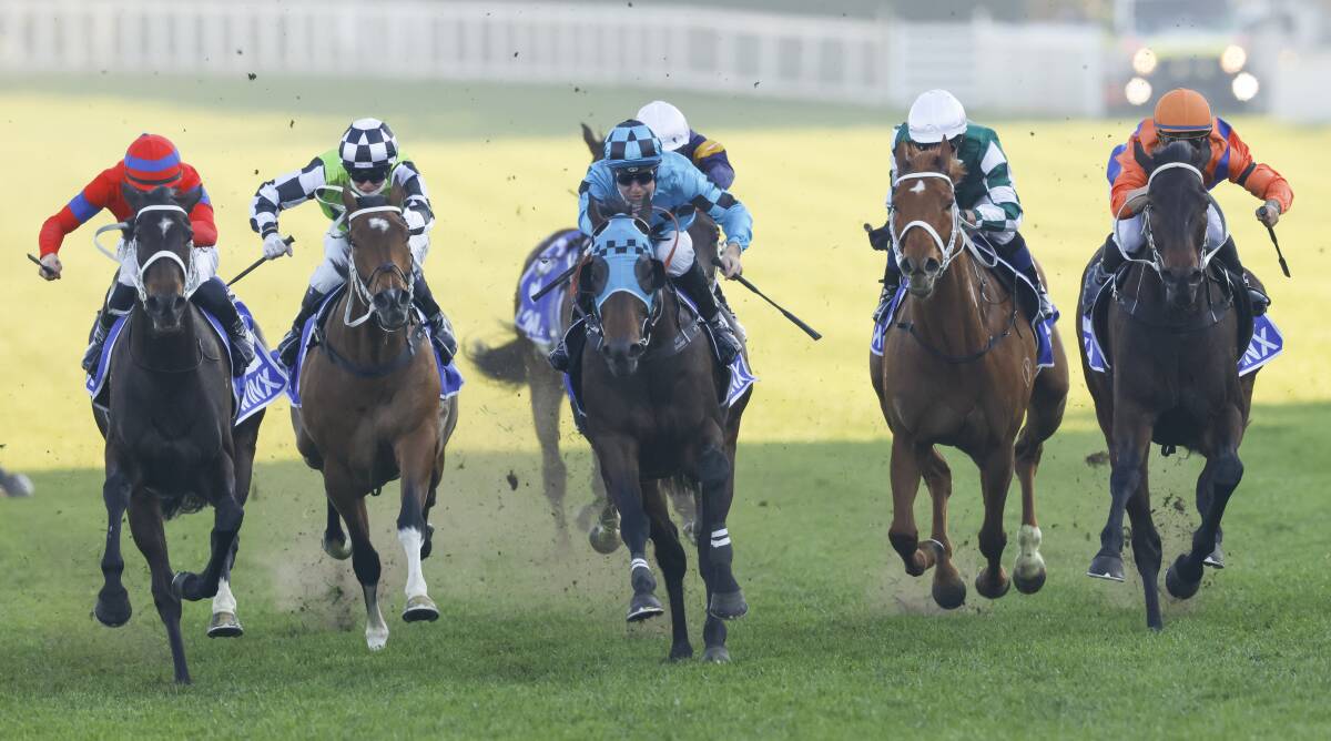 Think It Over (right) fights on as Mo'unga (left) claims the Winx Stakes. Photo: Mark Evans
