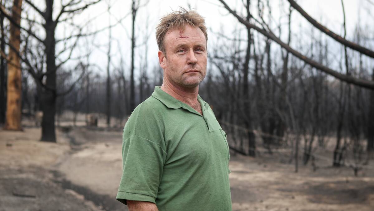 Awe-struck: Nowra man Mark Lloyd-Jones, who watched the fire come over on Saturday from inside the nearby house.
