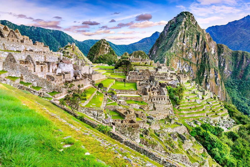 Marvel at the lost city of Machu Picchu, a 15th-century Inca citadel, located in the Eastern Cordillera of southern Peru, on a mountain ridge 2,430 metres above sea level.