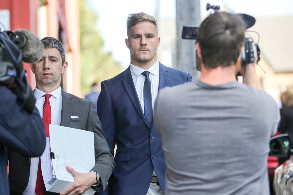 Jack de Belin leaves Wollongong Local Court in May after his lawyer, Robert Foster, mentioned the case on his behalf. Photo: Adam McLean