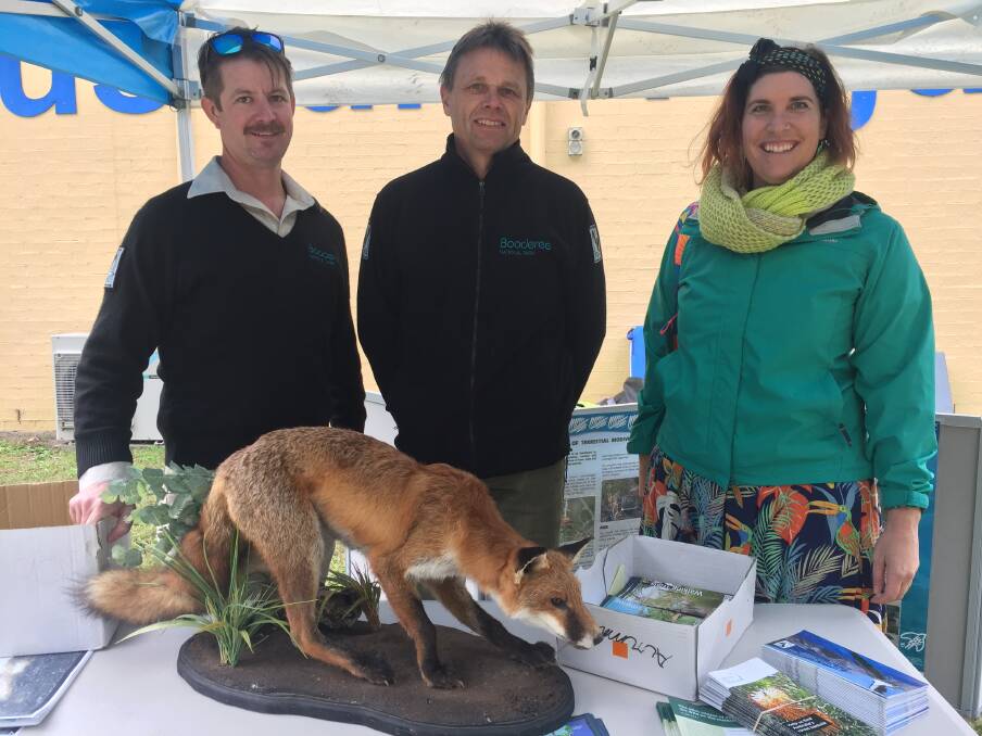 FAIR: National Park rangers Dion Maple and Stig Pedeson with fair organiser Emma-Lee Crane at the World Environment Day Fair on Saturday. Picture: Rebecca Fist