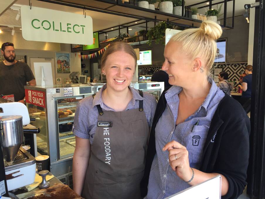 Caltex Bomaderry Foodary staff Alannah Forde and Emma Foley, busy making discounted coffees for the bikies on Saturday morning.