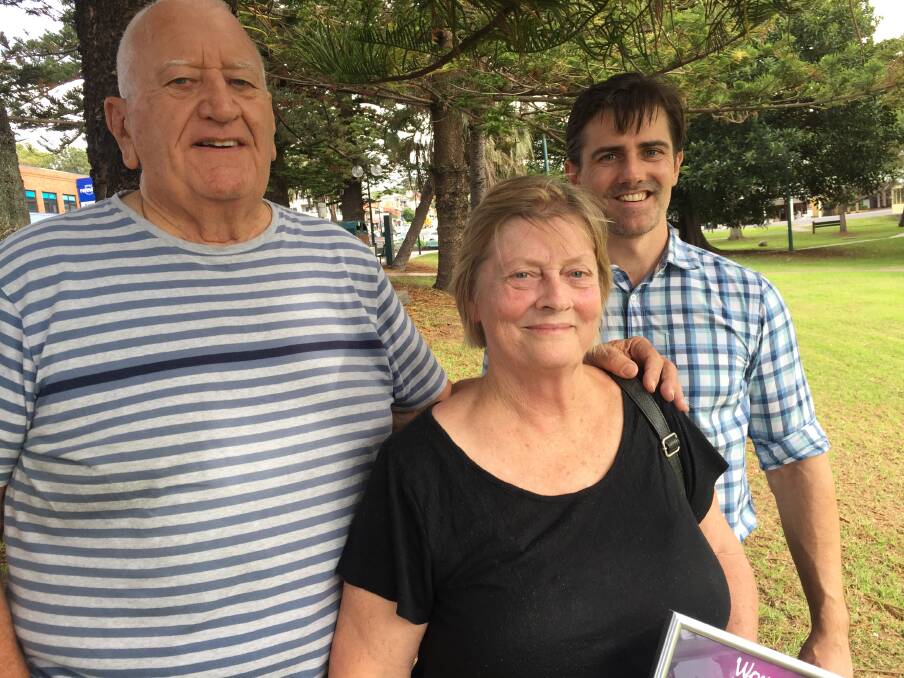 Cambewarra's Lynne Allen with her husband, Jack, and son, Liam after receiving her award at Gareth Ward's office in Kiama on Friday. 