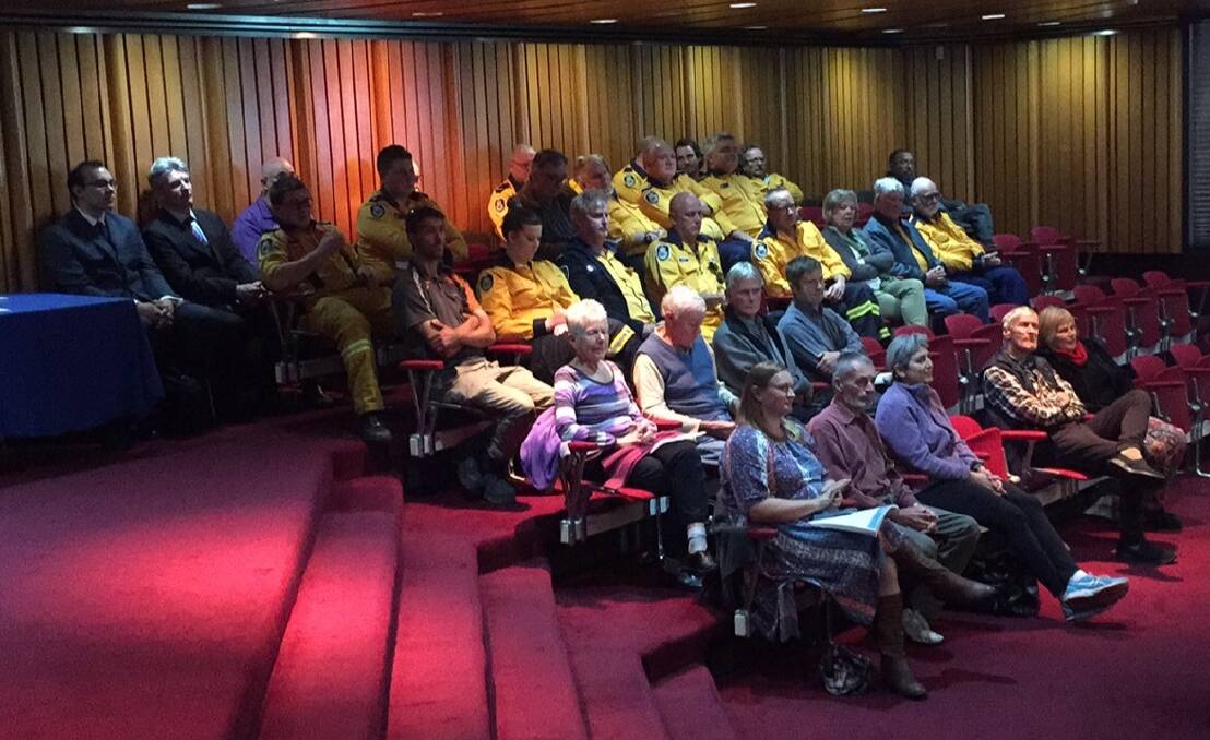 Shoalhaven Rural Fire Service volunteers pack the gallery at the extra ordinary council meeting on Tuesday night.