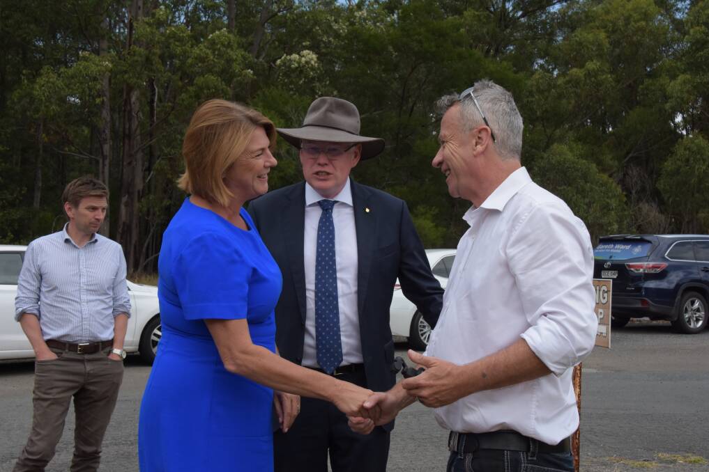 GOOD NEWS: NSW Roads Minister Melinda Pavey greets South Coast Register editor John Hanscombe, with Kiama MP Gareth Ward at Tomerong on Wednesday morning. Picture: Rebecca Fist