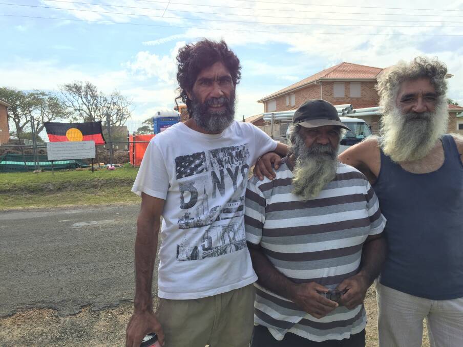 JERRINJA MEN: Ron Carberry, Uncle Gerald Carberry and Graham Connolly Junior across the road from the site of the historic ration shack in Orient Point on Friday. Picture: Rebecca Fist