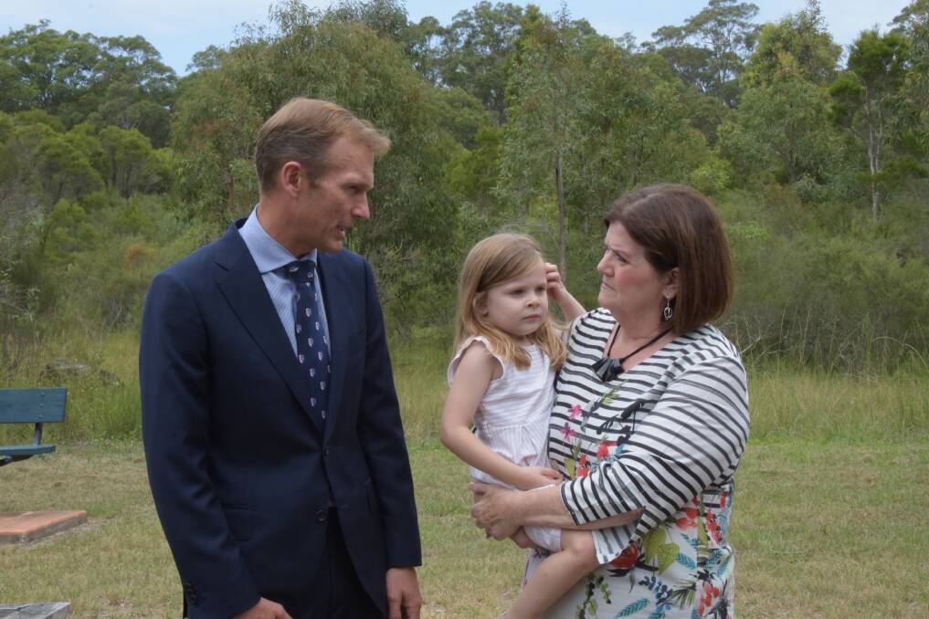 NSW Education Minister Rob Stokes, South Coast MP Shelley Hancock and her granddaughter Grace, 5, at Worrigee on Wednesday. Picture: Rebecca Fist