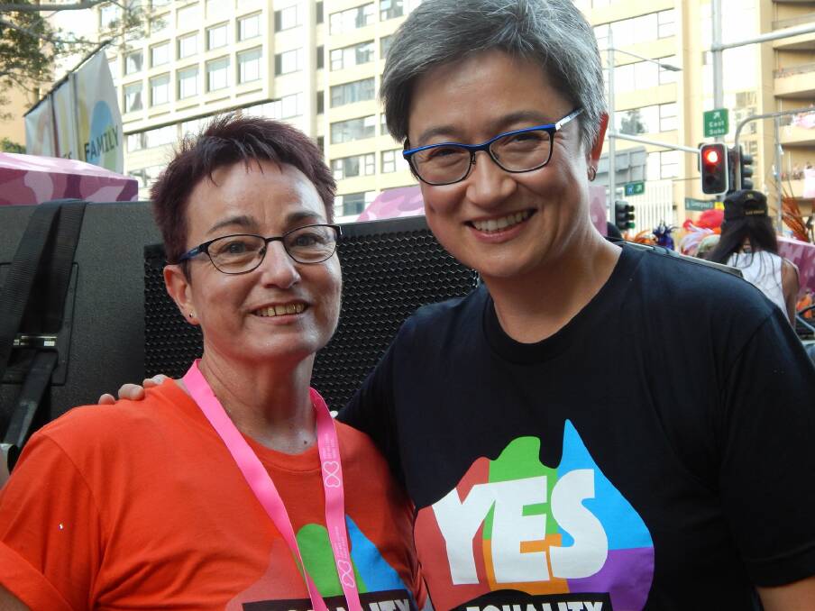 Gilmore marriage equality activist Dawn Hawkins and MP Penny Wong at Mardi Gras in 2018.