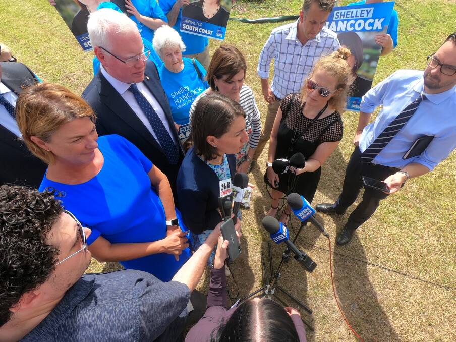 PRESS SCRUM: Melinda Pavey, Gareth Ward, Shelley Hancock, Andrew Constance  and Gladys Berejiklian making a billion-dollar commitment to the Princes Highway in Tomerong on Wednesday. Picture: John Hanscombe