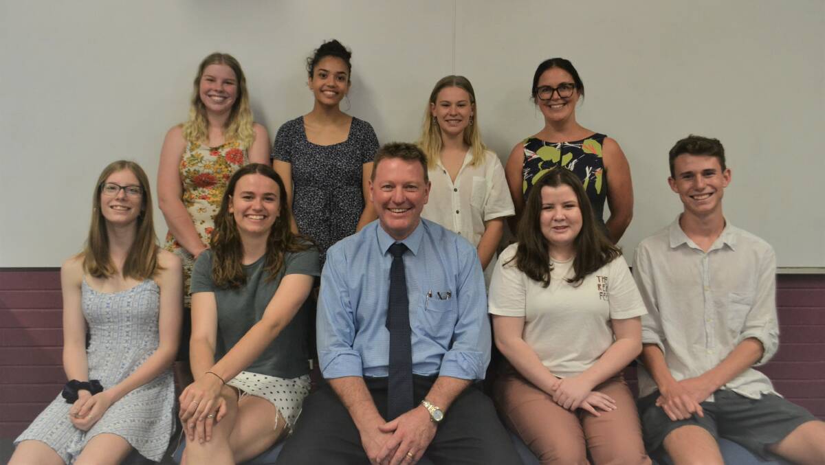 HIGH ACHIEVERS: Vincentia High's Class of 2018 (front from left) Madeleine Cooper, Ellie Wright-Pedersen, Principal Ken Bates, Lauren Allen and Jackson Andre, (back from left) Chloe Mayberry, Tathra Difinubun, Terri Milani and Year 12 Year Adviser Gabrielle Hobbs on Monday. Picture: Rebecca Fist 
